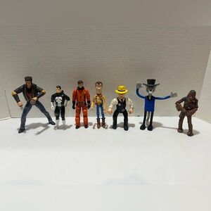 7 figures:Chewbacca, Cat, DICK TRACY, Toy Story, Doctor Who, Punisher, Wolverine